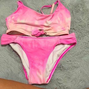 The colors are pink light baby pink and white the brand is no boundaries